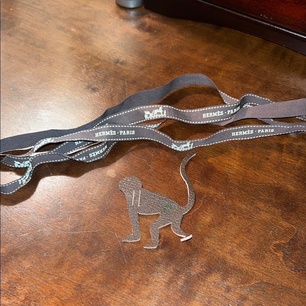 Hermès Paris Ribbon with Leather Monkey Cutout